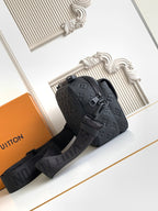 Louis Vuitton monogram crossbody bag, dark, with adjustable shoulder strap and front patch