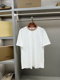 White short-sleeve T-shirt with tan crew neck and red trim, small chest logo.