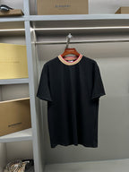 Burberry black short-sleeve crew-neck shirt, beige and red striped collar trim
