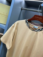 Beige short-sleeve T-shirt with close-up plaid crew neckline trim