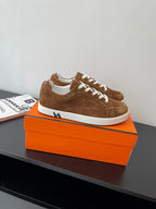 Hermes ladies suede sneakers in brown with white laces and side H detail