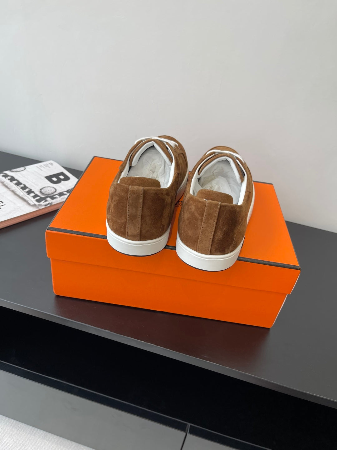 Hermes ladies brown suede sneakers, rear heel panels and white laces visible
