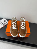 Hermes ladies suede sneakers, brown with white laces and rubber sole