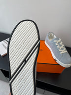 Hermes sneaker outsole view with textured tread and white base