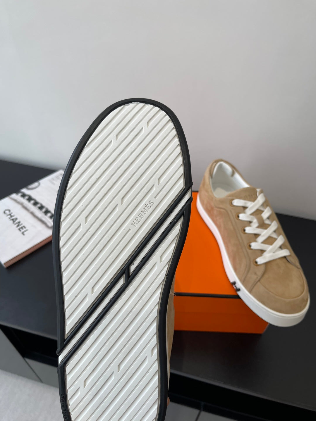 Hermes ladies sneaker outsole with white tread and dark edge