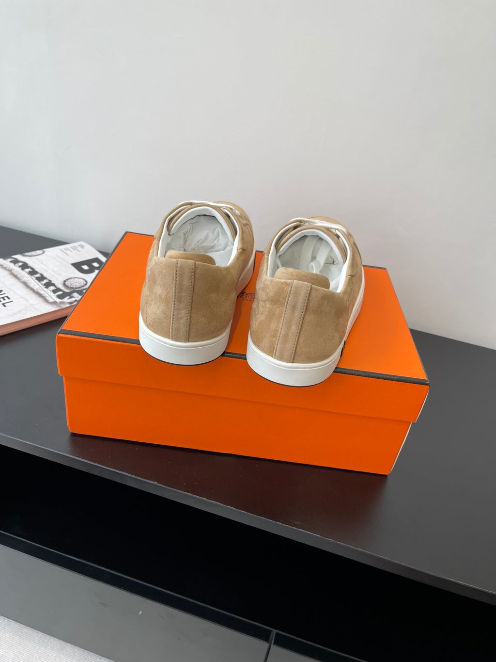 Hermes ladies sneakers rear view in tan suede with white laces