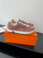 Hermes ladies suede low-top sneakers, dusty rose upper with white rubber sole