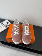 Hermes ladies suede low-top sneakers in dusty rose with white lace-up detailing