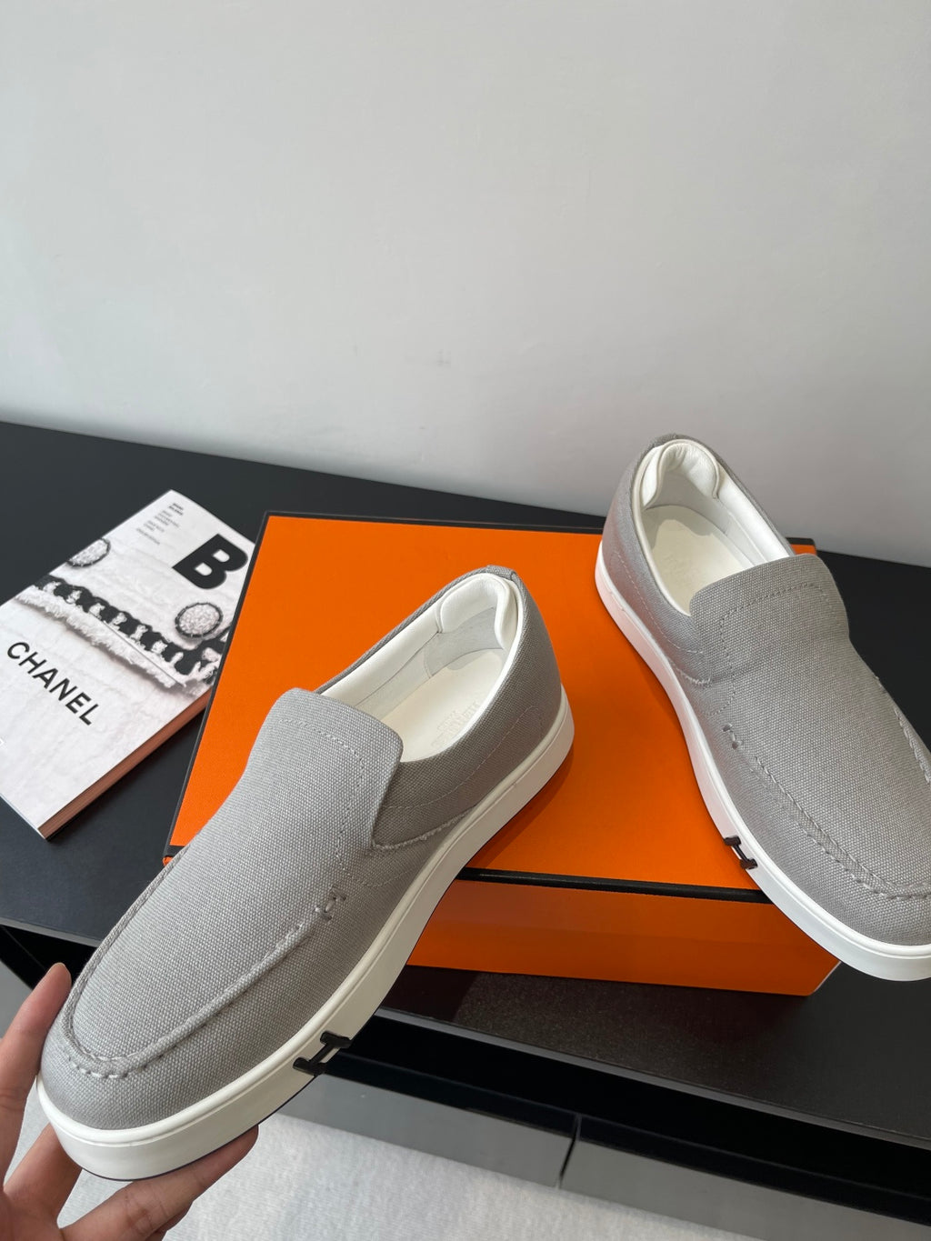 Hermes slip-on sneakers, light gray canvas with contrast white sole and seam detail