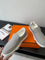 Hermes slip-on sneakers, light gray canvas with contrast white sole and seam detail