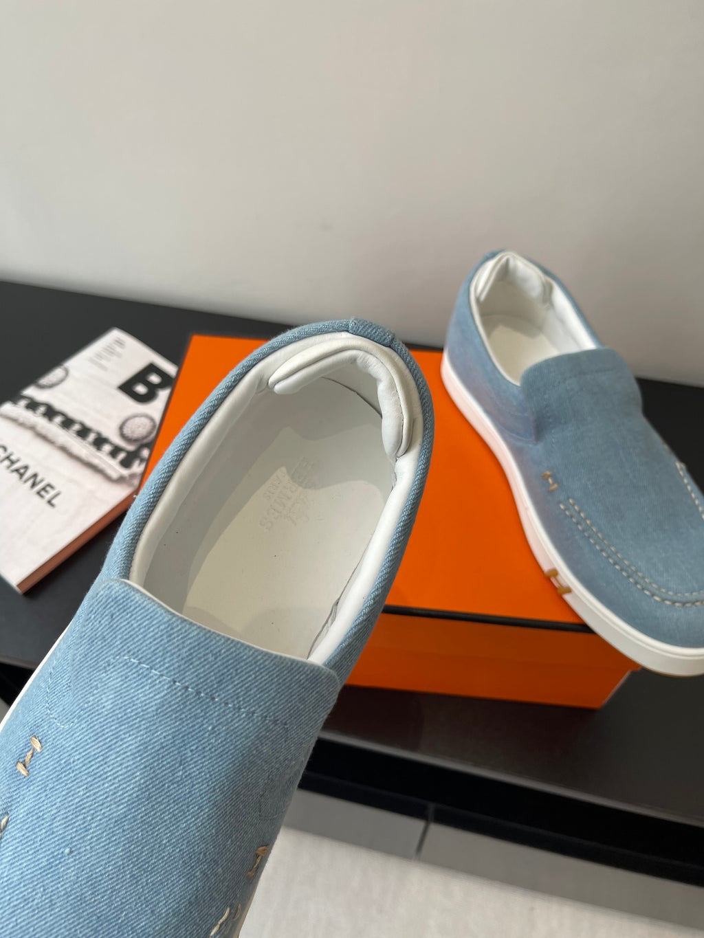 Hermes ladies blue denim slip-on loafer with white lining and contrast stitching