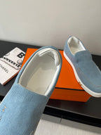 Hermes ladies blue denim slip-on loafer with white lining and contrast stitching