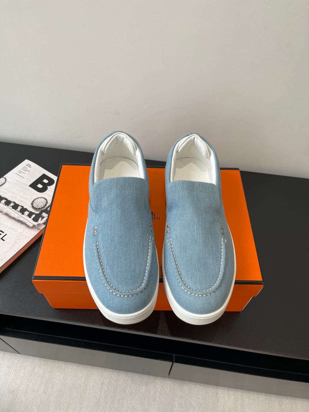 Hermes ladies blue denim slip-on loafers with white sole, stitched seams