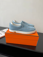 Hermes ladies blue denim slip-on loafers with white sole, low-profile design