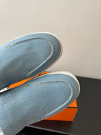 Hermes ladies blue denim slip-on loafer toe seam detail, white sole edge