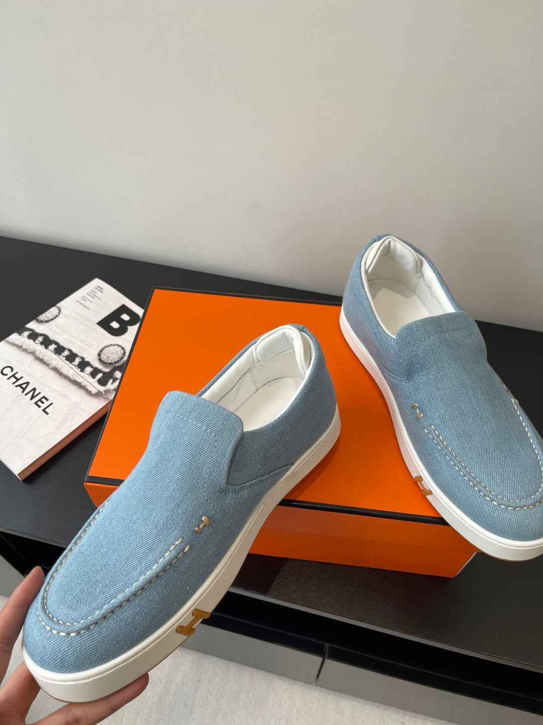 Hermes ladies light-blue denim slip-on loafers with white soles and gold logo