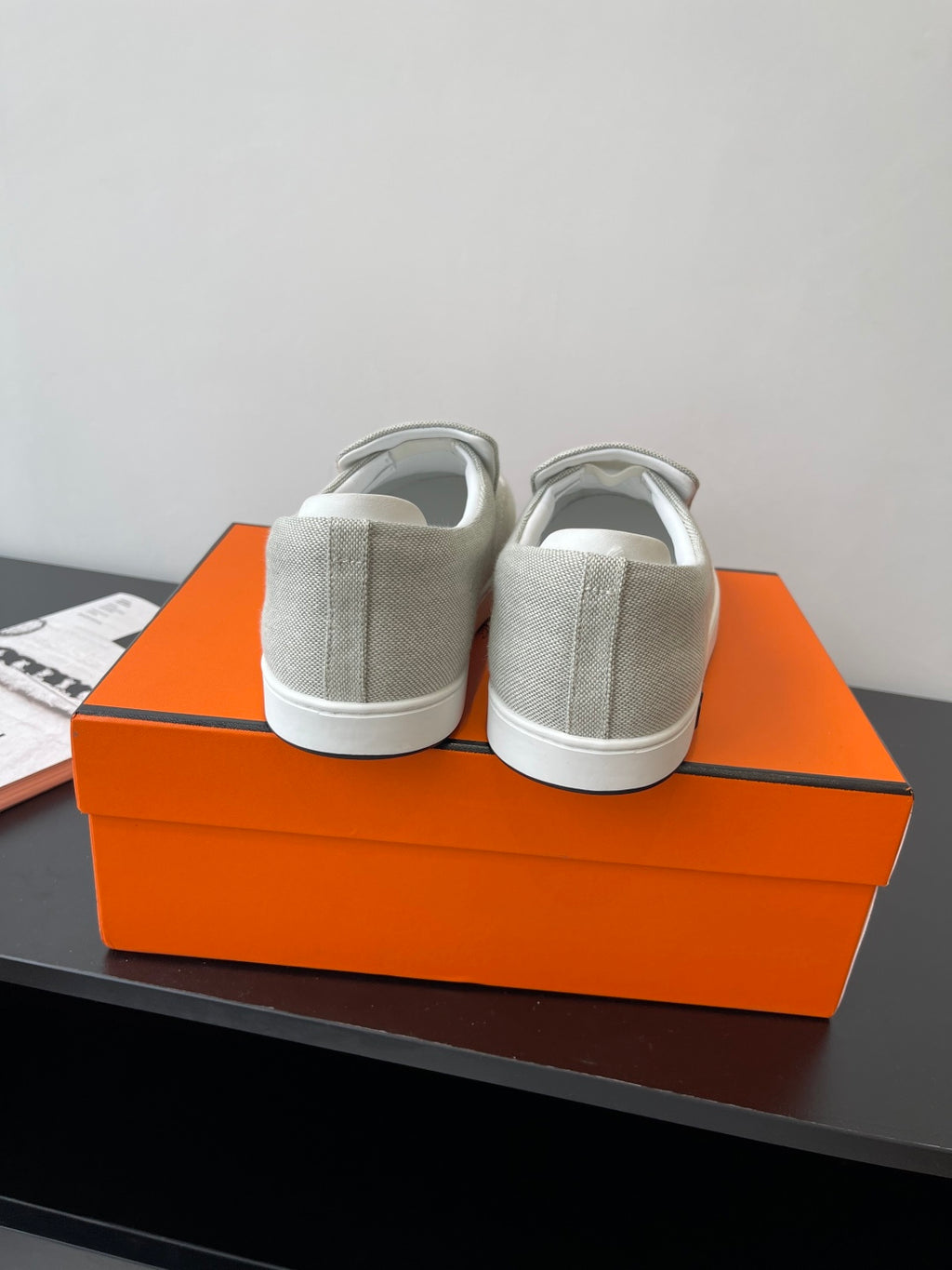 Hermes ladies light gray canvas slip-on sneakers, rear view with heel loop, white sole