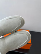 Hermes ladies light gray canvas slip-on sneakers, close-up textured fabric toe and seam
