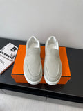 Hermes ladies light gray canvas slip-on sneakers with white rubber sole, stitched toe