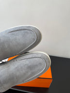 Hermes women’s gray suede slip-on sneaker close-up of toe and heel