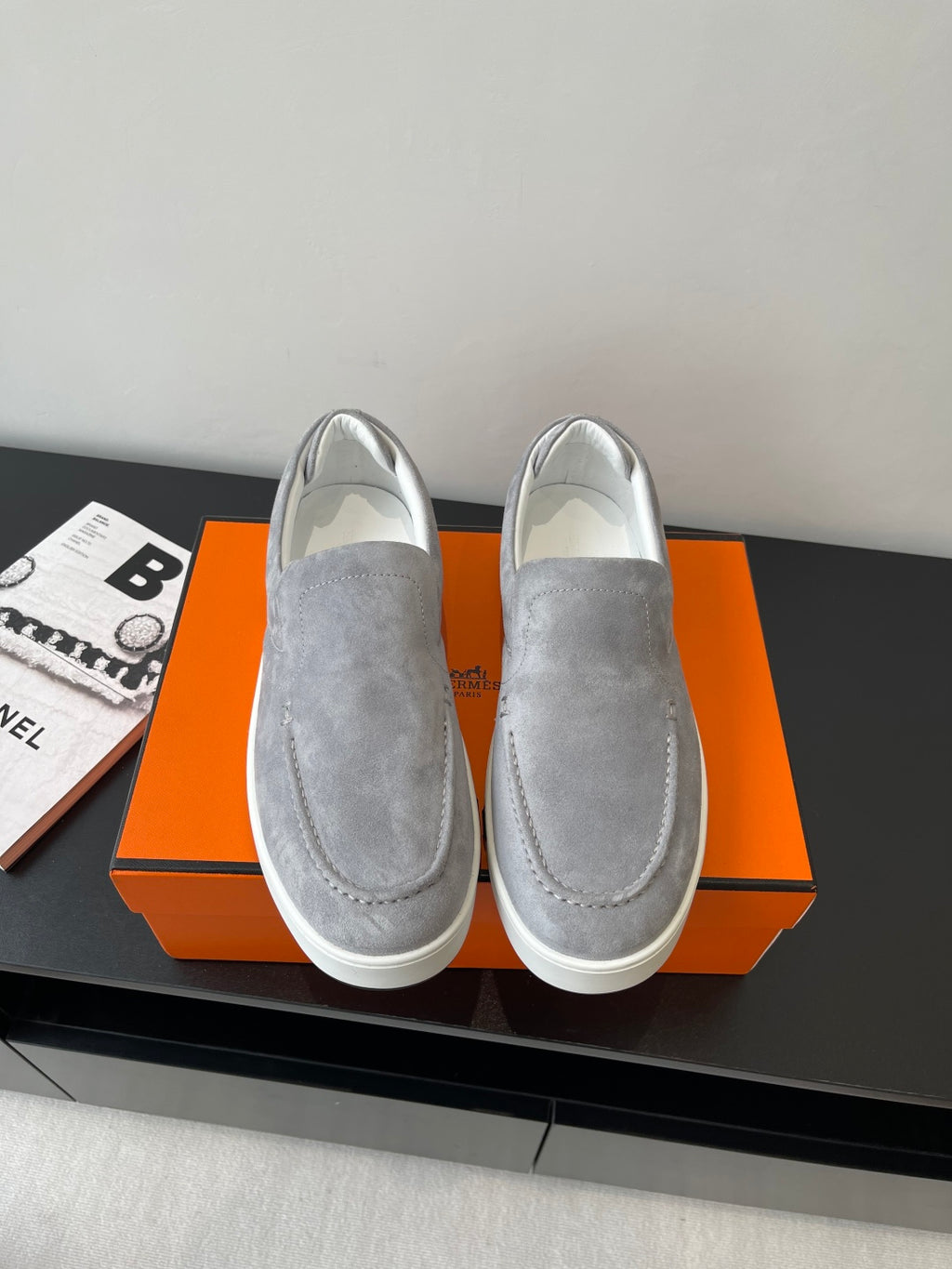 Hermes women’s gray suede slip-on sneakers with white rubber sole, round toe