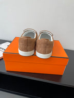 Hermes suede slip-on loafers, tan/brown pair with white rubber sole