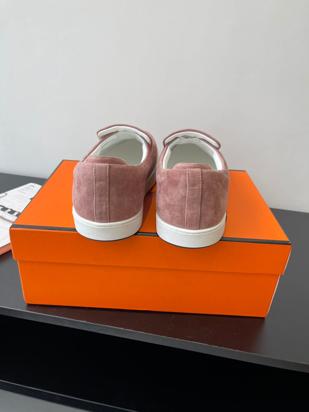 Pair of women’s mauve suede loafers with back view, slip-on collar, white sole