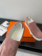 Ladies mauve suede loafers with cushioned interior lining and white rubber sole edge