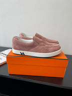 Mauve suede slip-on loafer for women with white platform sole and stitched trim