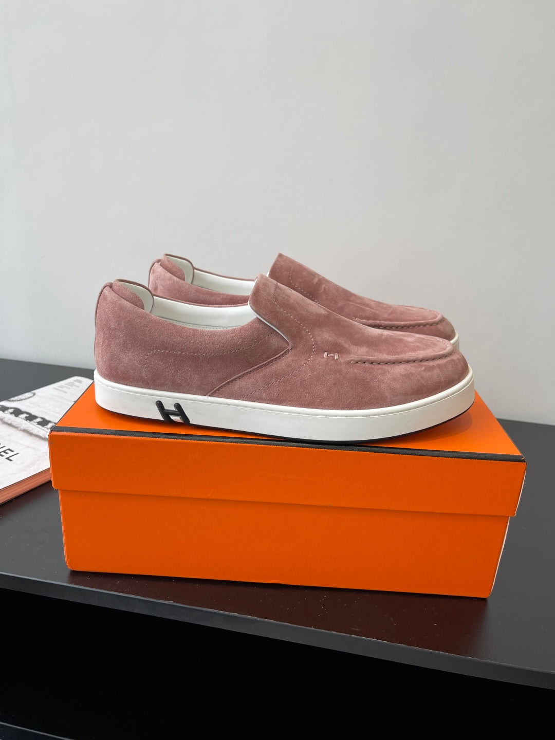 Mauve suede slip-on loafer for women with white platform sole and stitched trim