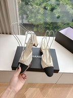 Two-tone women’s slingback heels with Chanel logo strap, textured beige and black