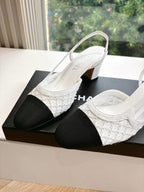 Two-tone women's slingback heels with textured white sides and dark toe blocks