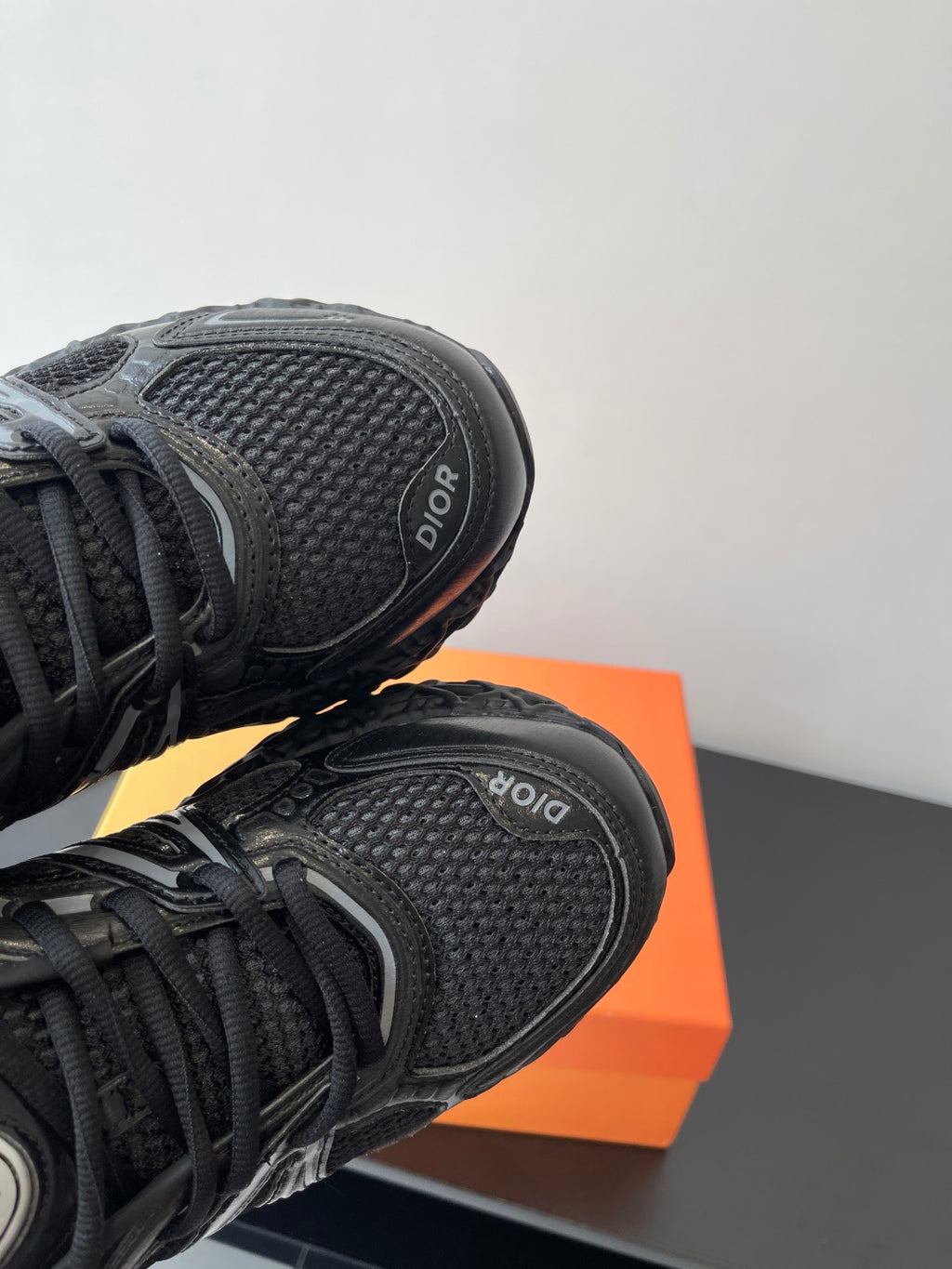 Dior ladies sneakers heel, black textured upper with Dior emblem