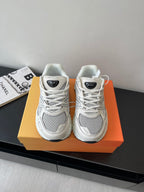 White mesh lace-up sneakers with Dior logo patch and chunky tread sole