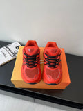 Red Dior ladies sneakers with black laces and mesh upper