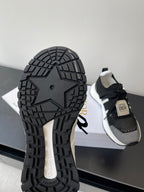 Dior women's sneaker outsole with thick tread and geometric lug pattern
