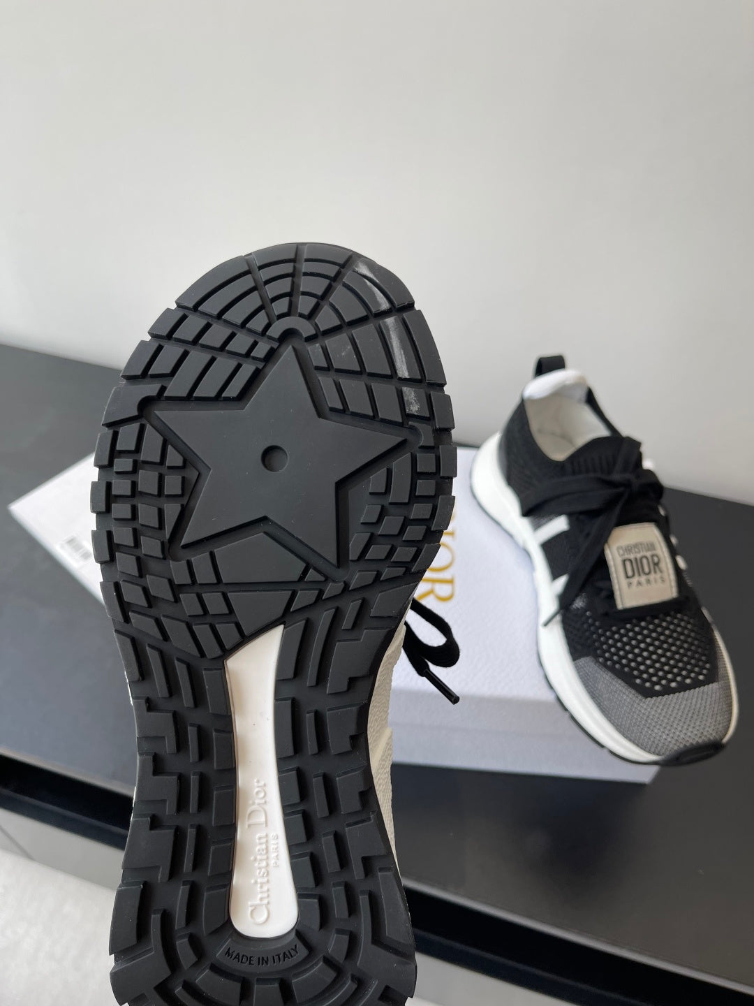 Dior women's sneaker outsole with thick tread and geometric lug pattern