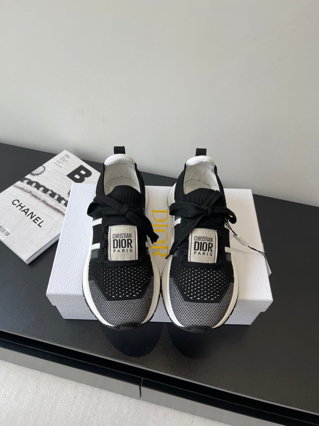 Dior women's black knit sneakers with white sole, lace-up and logo tongue patch