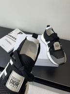 Dior women's black lace-up sneakers with logo tongue label and padded collar