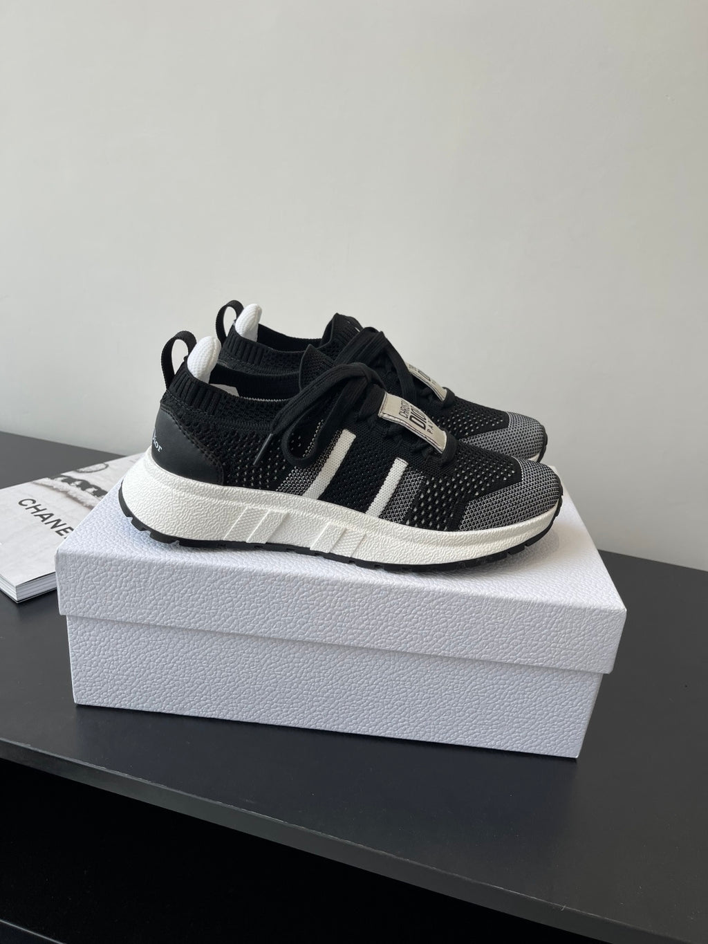 Dior women's black knit sneakers with black laces and white midsole
