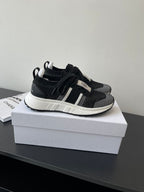 Dior women's black knit sneakers with black laces and white midsole