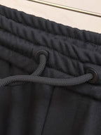 Versace black drawstring waist with textured cord and eyelet