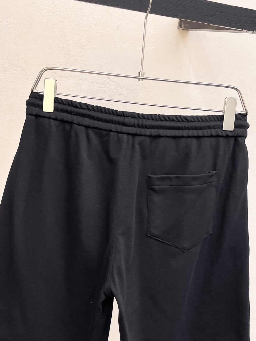 Versace black shorts with front pocket and gold side buttons