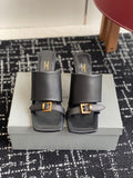 Balenciaga black heeled sandals with square gold buckle straps