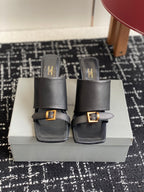 Balenciaga black heeled sandals with square gold buckle straps