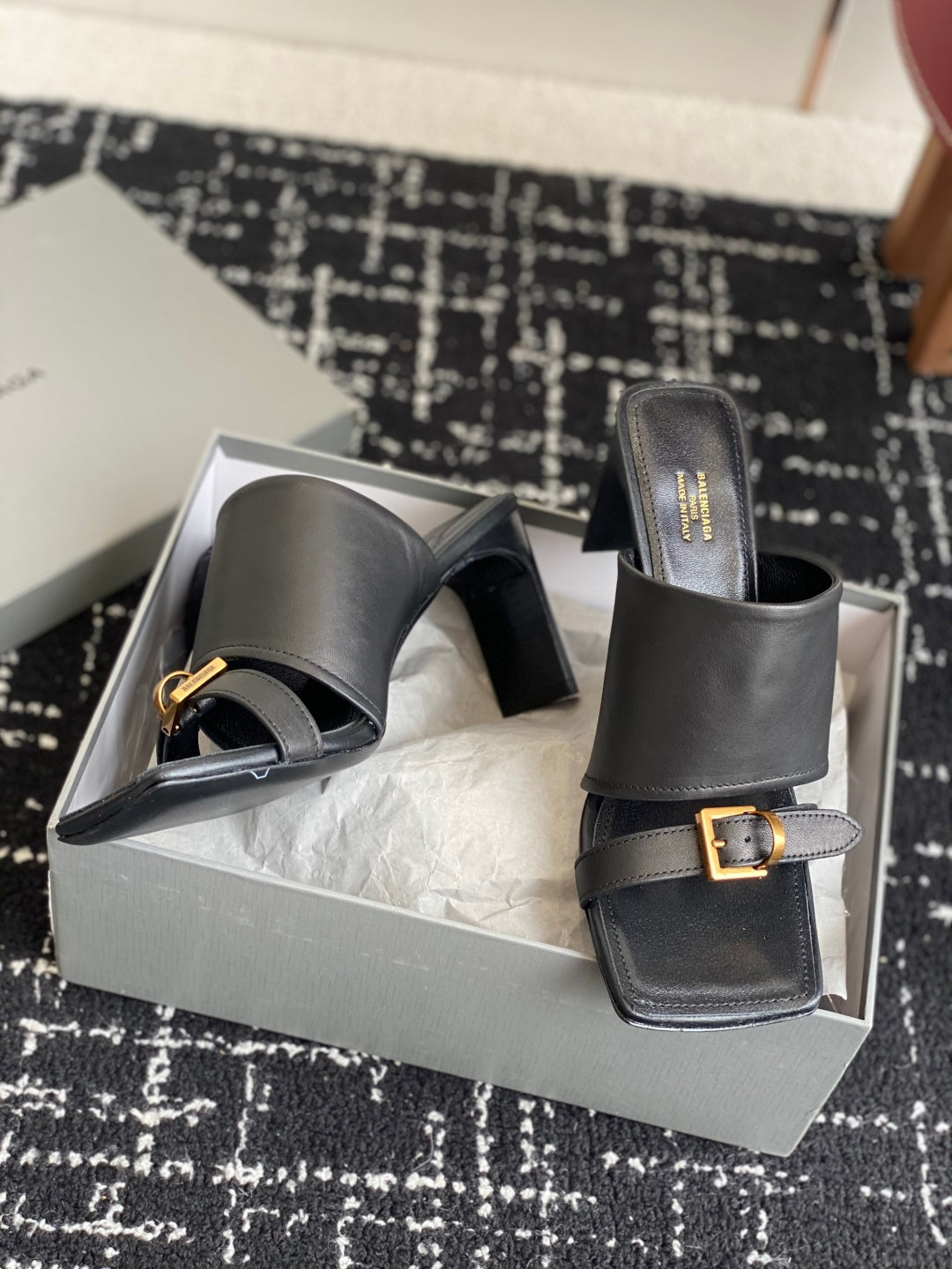 Balenciaga black heeled sandals with open toe and wide strap with gold buckle