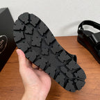 Prada unisex black sandal outsole with textured tread pattern and chunky platform base