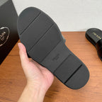 Prada black slide sandal outsole with textured tread