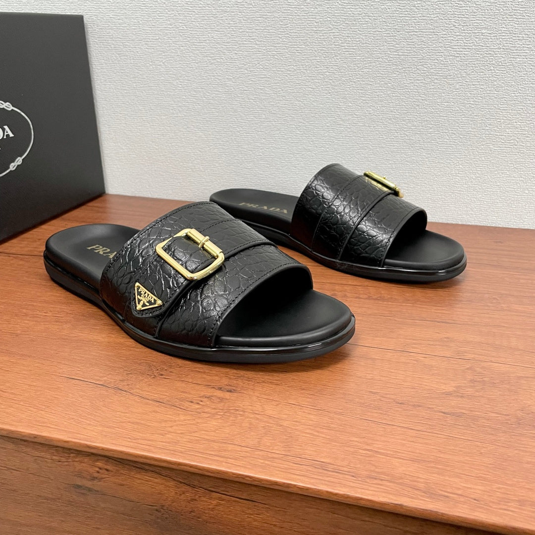 Prada black leather-look slide sandals with gold buckle