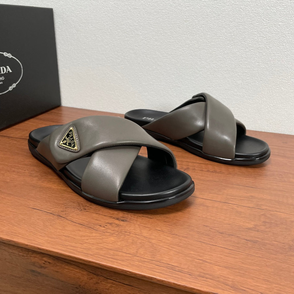 Gray Prada slide sandals, wide crossover straps and black rubber sole (pair)